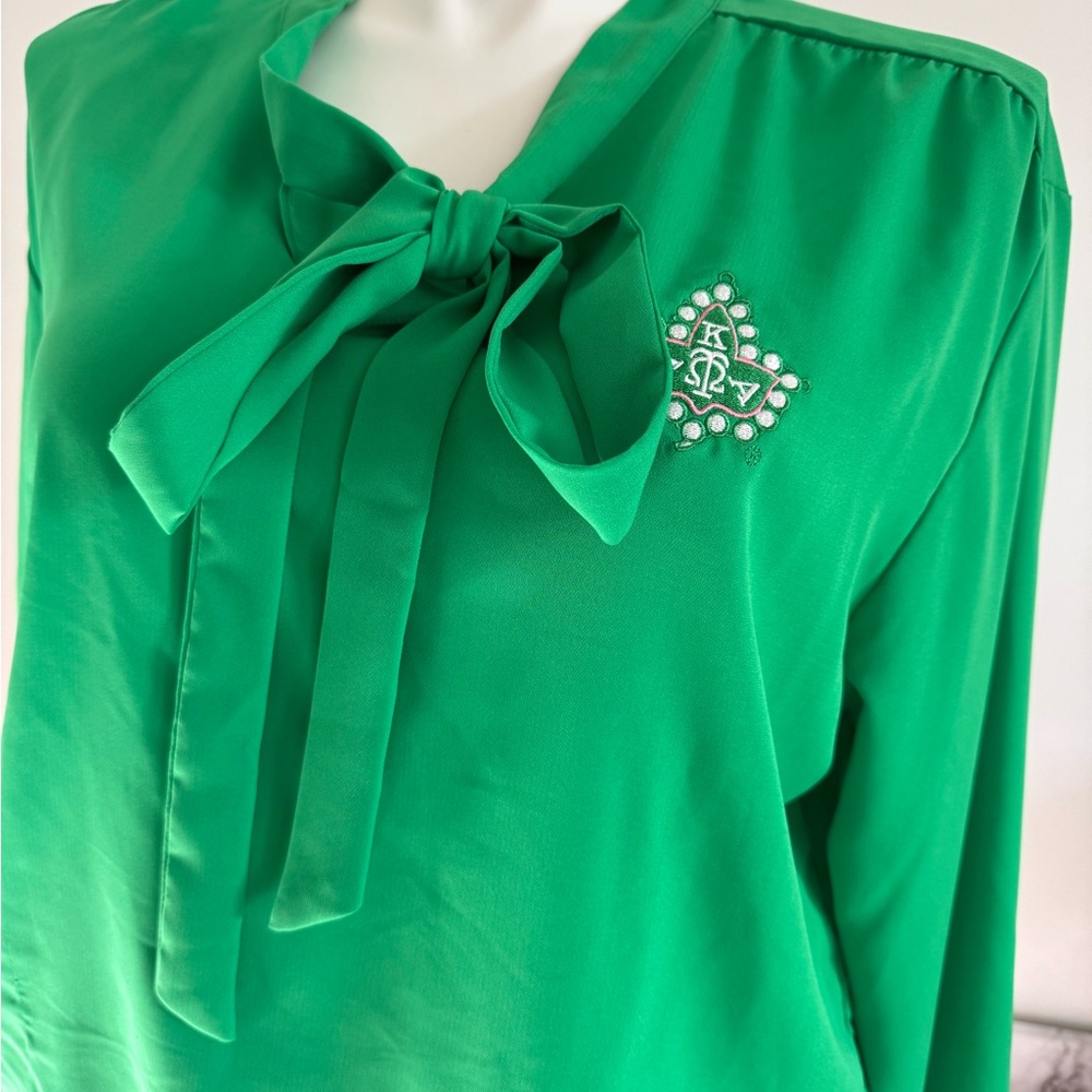 AKA long sleeve blouse w/tie